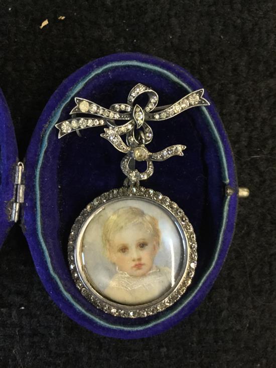 Paste set silver pendant brooch with painted ivory portrait